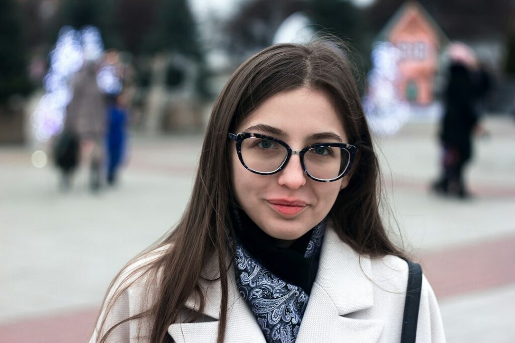 Woman wearing eyeglasses outdoors